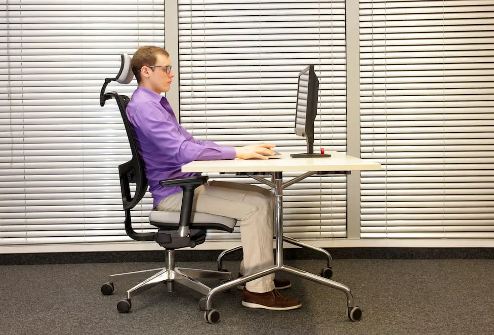 Desk with notebooks and peripherals arranged neatly