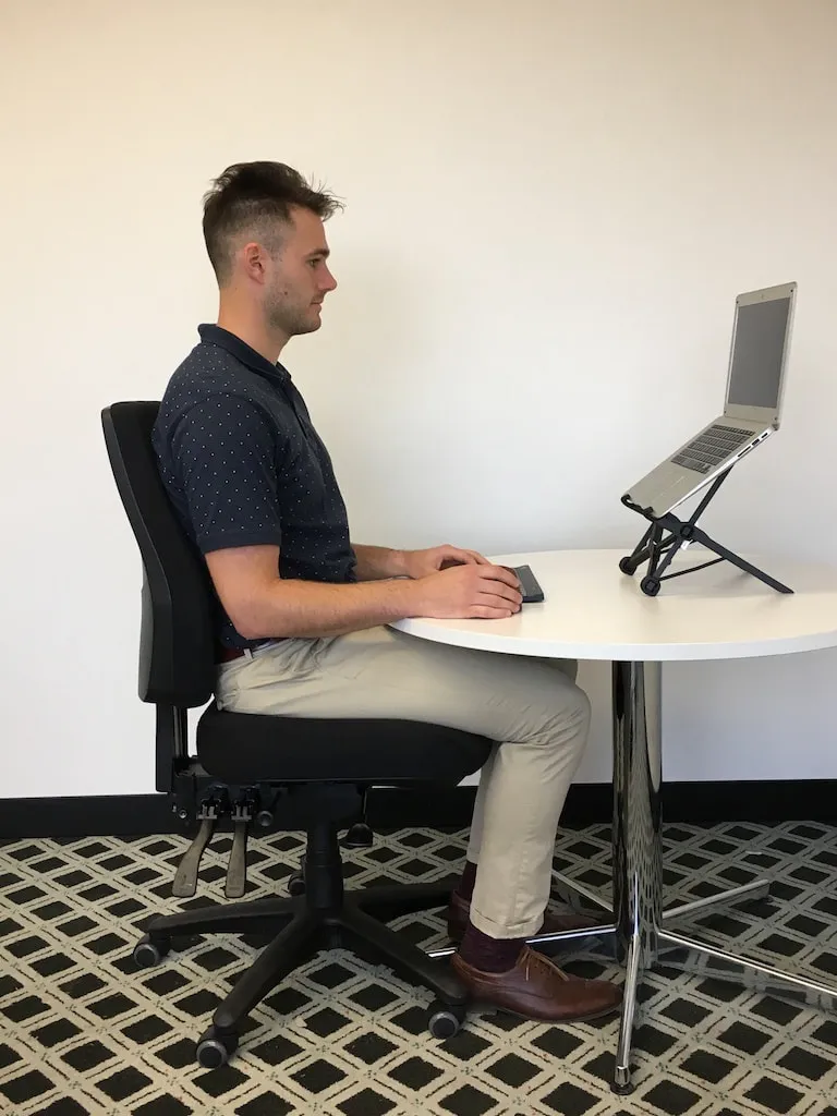 Narrow desk ledge with tall daylight washing the surface